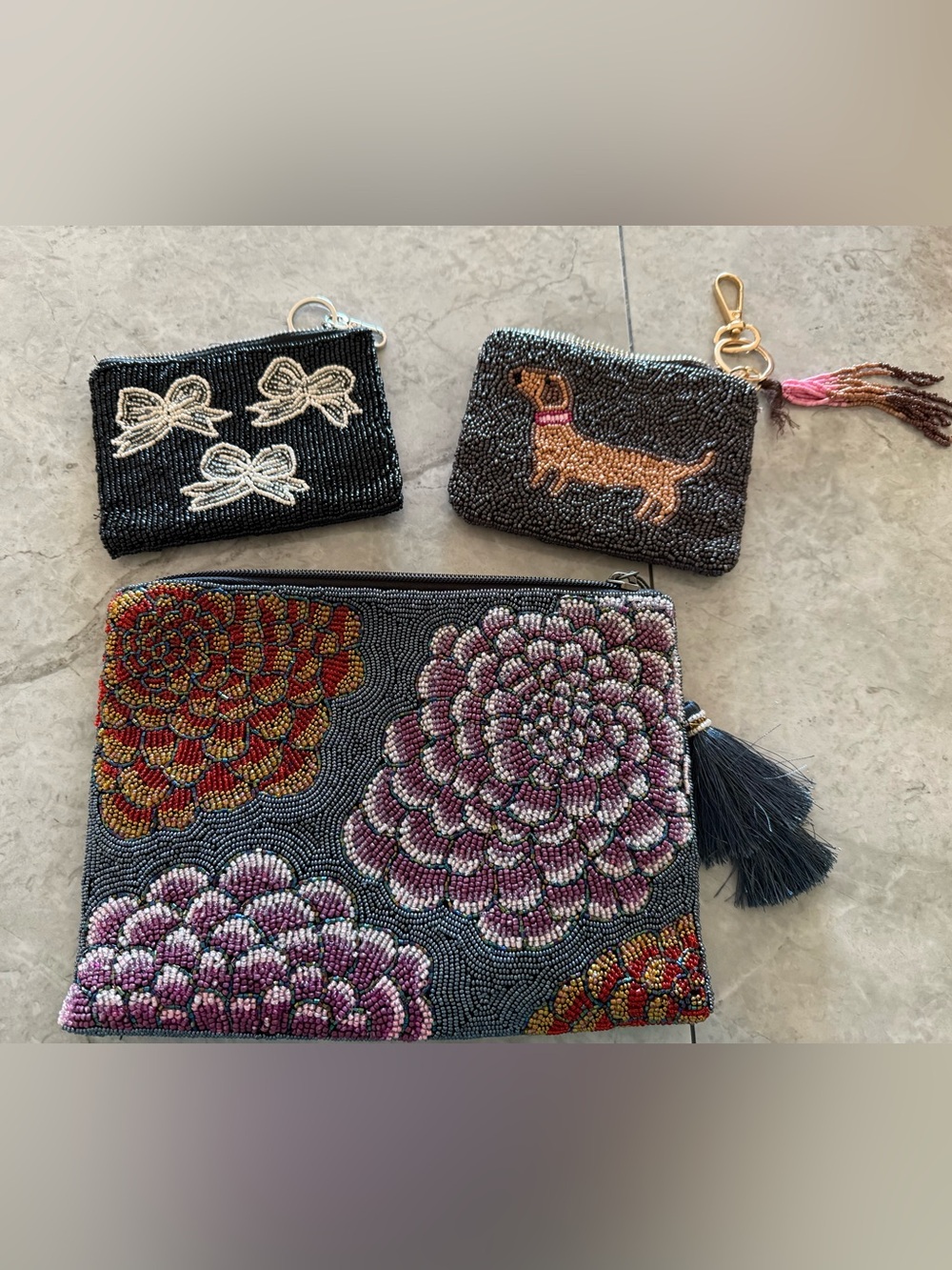 Set of 3 beaded pouches.